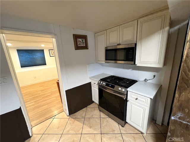1708 E 3rd St, Los Angeles, CA 90033 - kitchen with stainless steel appliances and light countertops