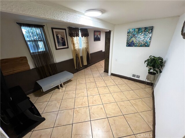 1708 E 3rd St, Los Angeles, CA 90033 - interior space with visible vents and light tile patterned floors