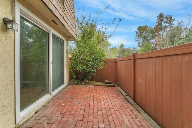 view of patio / terrace featuring a fenced backyard