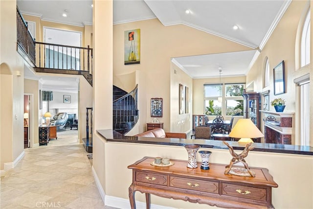 interior space featuring high vaulted ceiling, stairs, baseboards, ornamental molding, and recessed lighting