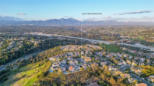 drone / aerial view featuring a mountain view and a residential view