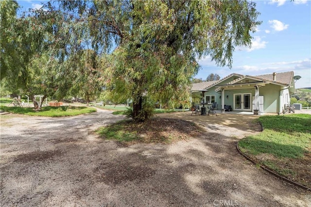 18181 Lost Creek Rd, Saugus, CA 91390 - view of front of house featuring french doors and stucco siding