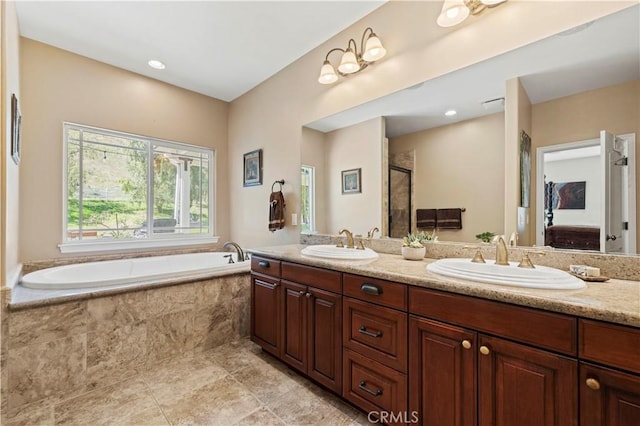 18181 Lost Creek Rd, Saugus, CA 91390 - ensuite bathroom featuring double vanity, a bath, and an enclosed shower