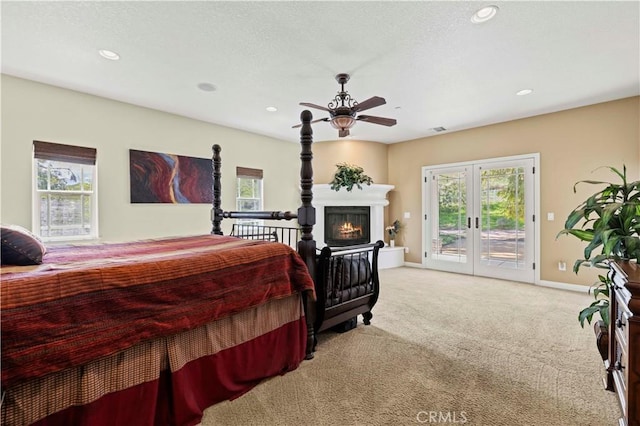18181 Lost Creek Rd, Saugus, CA 91390 - bedroom featuring access to exterior, carpet, a lit fireplace, recessed lighting, and baseboards