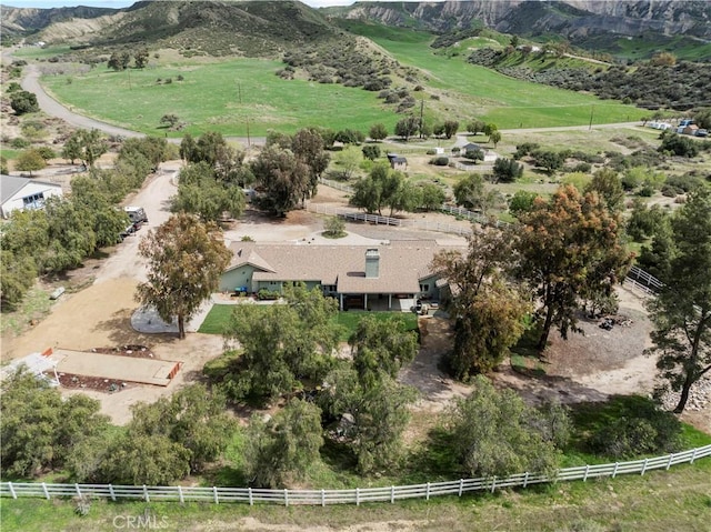 aerial view featuring a mountain view and a rural view