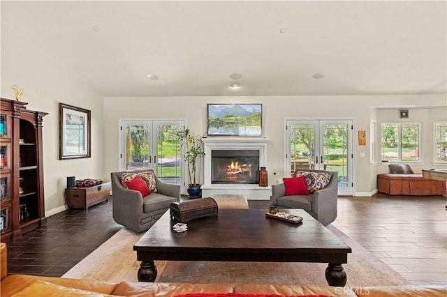 18181 Lost Creek Rd, Saugus, CA 91390 - living room with a glass covered fireplace, baseboards, dark wood-style flooring, and french doors