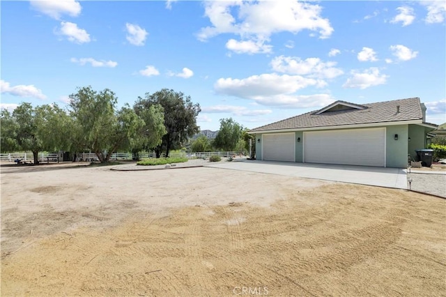 18181 Lost Creek Rd, Saugus, CA 91390 - view of home's exterior with driveway and stucco siding