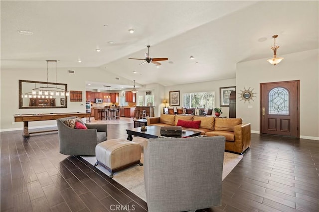 18181 Lost Creek Rd, Saugus, CA 91390 - living area featuring vaulted ceiling, dark wood-style floors, healthy amount of natural light, and ceiling fan
