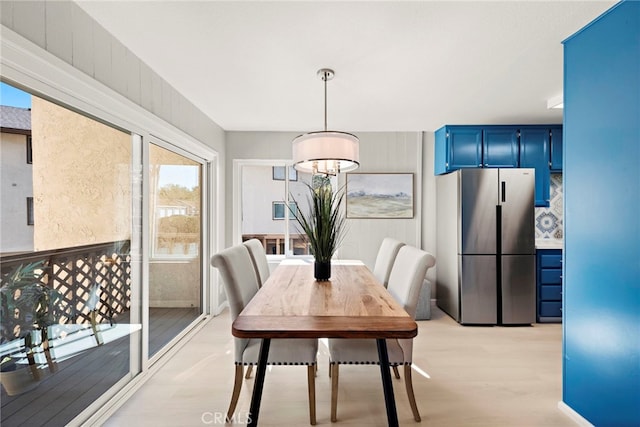 dining room with light wood-style floors