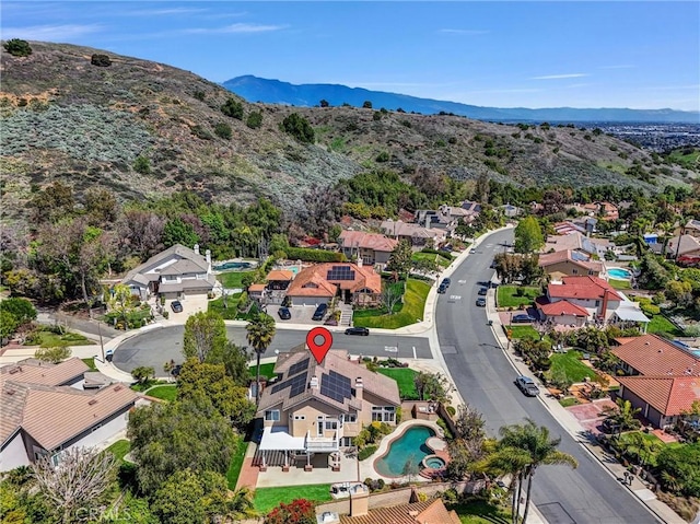 bird's eye view with a mountain view and a residential view
