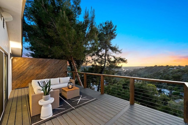 deck with an outdoor hangout area