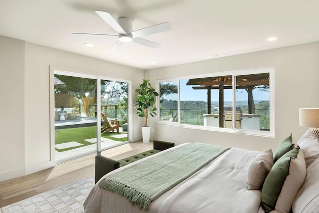 bedroom with recessed lighting, access to outside, baseboards, light wood-type flooring, and a ceiling fan