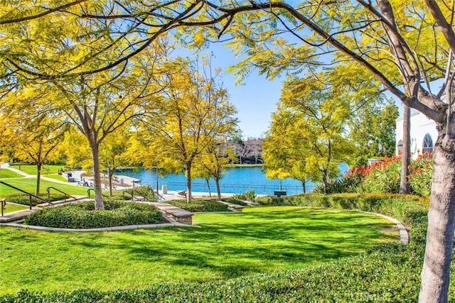 9 Las Piedras, Rancho Santa Margarita, CA 92688 - view of property's community featuring a lawn and a water view