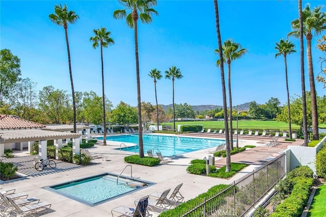 9 Las Piedras, Rancho Santa Margarita, CA 92688 - pool featuring fence, a hot tub, a pergola, a patio, and a mountain view