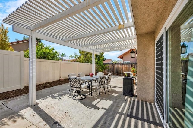 9 Las Piedras, Rancho Santa Margarita, CA 92688 - view of patio featuring a fenced backyard and outdoor dining space