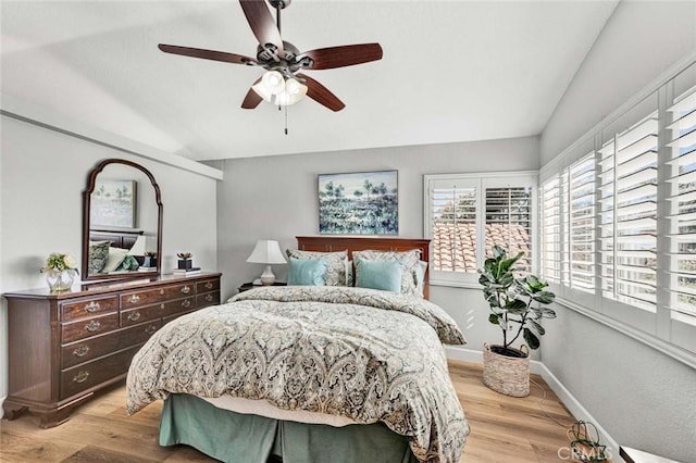 9 Las Piedras, Rancho Santa Margarita, CA 92688 - bedroom featuring baseboards, ceiling fan, vaulted ceiling, and light wood-style floors