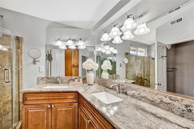 9 Las Piedras, Rancho Santa Margarita, CA 92688 - full bath with a shower stall, double vanity, visible vents, and a sink