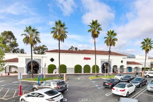 9 Las Piedras, Rancho Santa Margarita, CA 92688 - view of property featuring uncovered parking