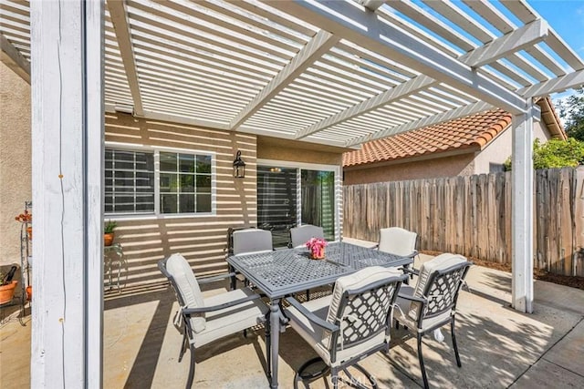9 Las Piedras, Rancho Santa Margarita, CA 92688 - view of patio with fence, outdoor dining area, and a pergola