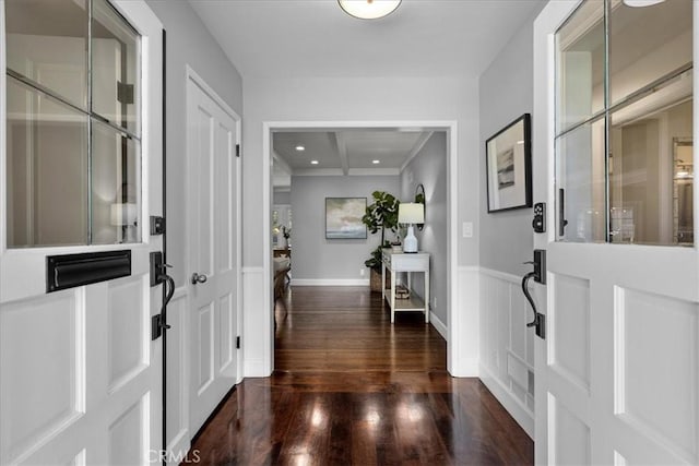 entryway featuring dark wood-style floors, baseboards, and recessed lighting