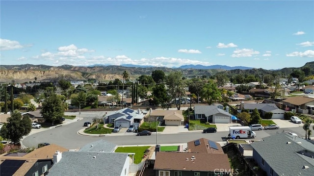 aerial view with a mountain view and a residential view