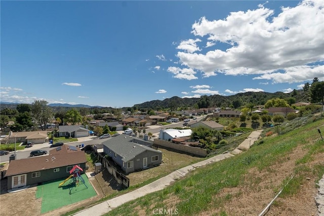 aerial view with a mountain view and a residential view