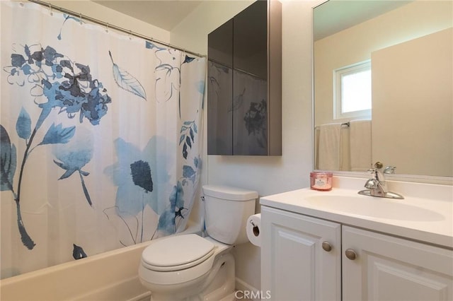 full bath with shower / bath combination with curtain, toilet, and vanity