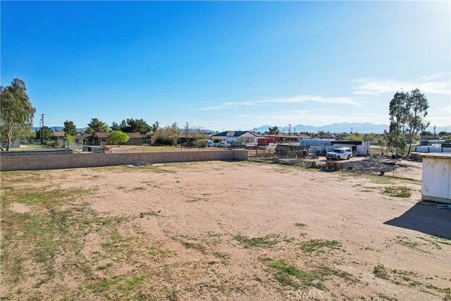 16621 Verano St, Hesperia, CA 92345 - view of yard featuring a mountain view and fence