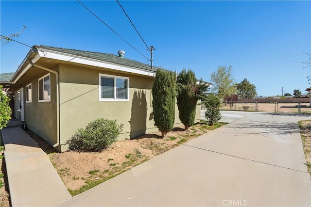 16621 Verano St, Hesperia, CA 92345 - view of home's exterior featuring stucco siding and fence