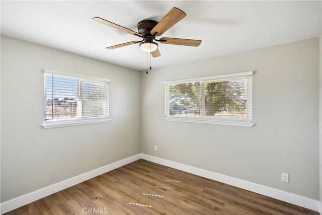 16621 Verano St, Hesperia, CA 92345 - unfurnished room with plenty of natural light, baseboards, and wood finished floors