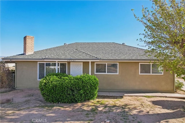 16621 Verano St, Hesperia, CA 92345 - view of front of property with a chimney, stucco siding, and a shingled roof