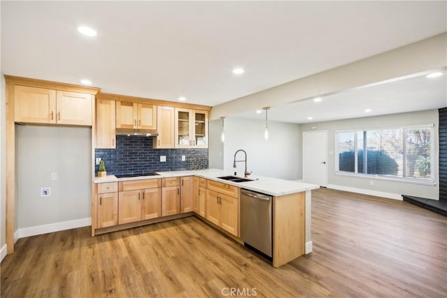 16621 Verano St, Hesperia, CA 92345 - kitchen with stainless steel dishwasher, light brown cabinets, a sink, a peninsula, and recessed lighting