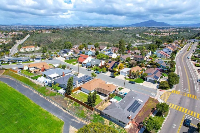 birds eye view of property with a residential view and a mountain view