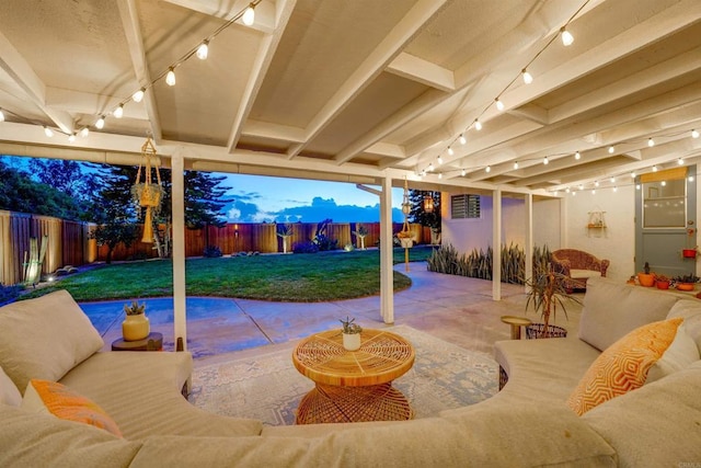 exterior space with outdoor lounge area and a fenced backyard