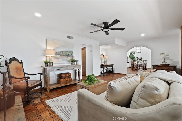 27955 Gallina, Mission Viejo, CA 92692 - living area with arched walkways, ceiling fan, ornamental molding, and recessed lighting