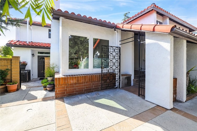 27955 Gallina, Mission Viejo, CA 92692 - mediterranean / spanish-style home featuring a tile roof, stucco siding, and a patio