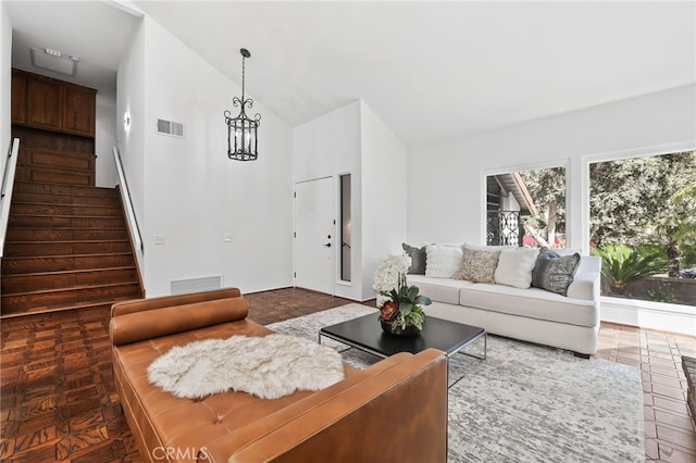 27955 Gallina, Mission Viejo, CA 92692 - living room with stairs, high vaulted ceiling, and a chandelier