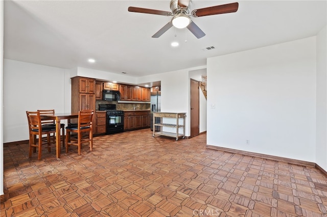 27955 Gallina, Mission Viejo, CA 92692 - kitchen with black appliances, backsplash, ceiling fan, brown cabinetry, and recessed lighting