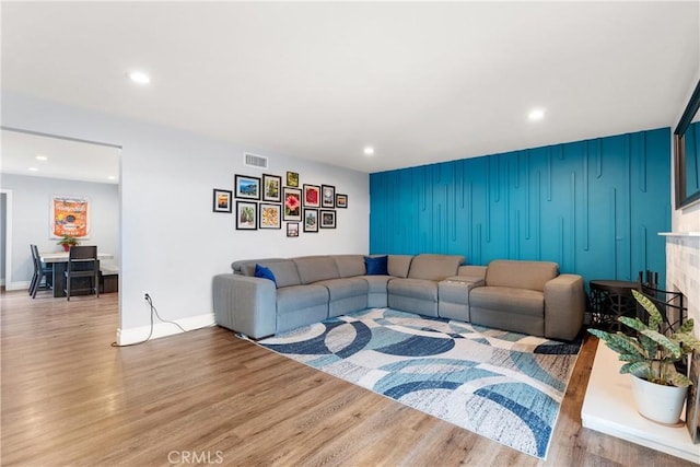 16680 Cedar Cir, Fountain Valley, CA 92708 - living room with recessed lighting, light wood-style flooring, baseboards, and an accent wall