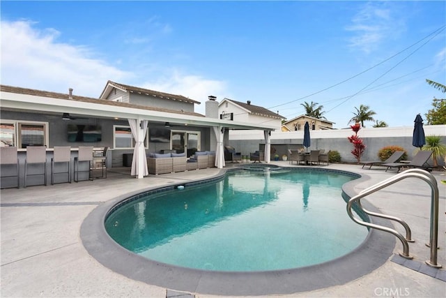 16680 Cedar Cir, Fountain Valley, CA 92708 - view of swimming pool featuring an outdoor living space, a patio area, ceiling fan, and a pool with connected hot tub
