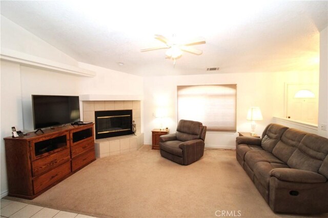 17255 Donert St, Hesperia, CA 92345 - living area featuring visible vents, baseboards, ceiling fan, a fireplace, and carpet flooring
