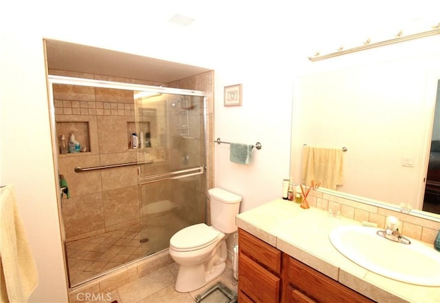 17255 Donert St, Hesperia, CA 92345 - full bath featuring vanity, ensuite bath, toilet, a stall shower, and tile patterned floors