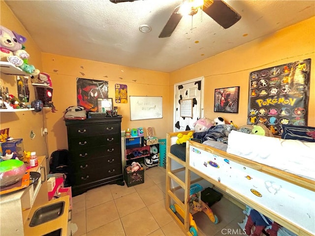 238 Kellog Ave, Fullerton, CA 92833 - bedroom with light tile patterned floors and ceiling fan