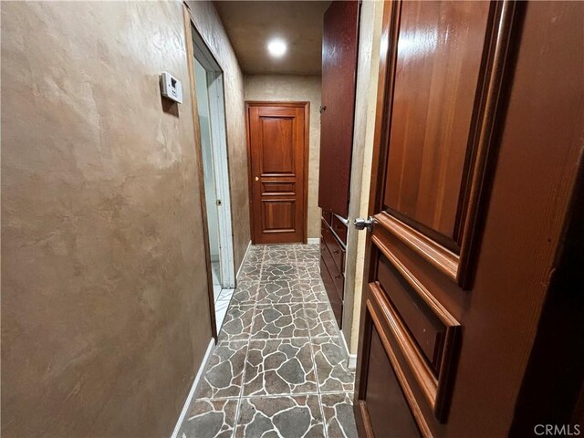 238 Kellog Ave, Fullerton, CA 92833 - hallway with stone floors and recessed lighting
