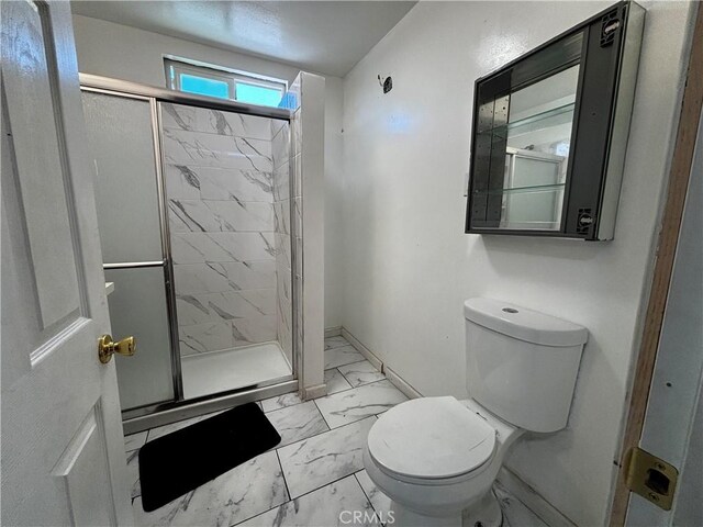 238 Kellog Ave, Fullerton, CA 92833 - bathroom featuring marble look tile flooring and a shower stall