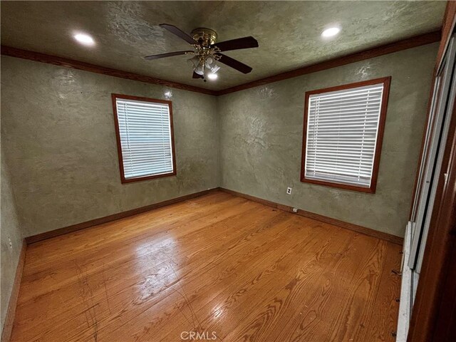 238 Kellog Ave, Fullerton, CA 92833 - unfurnished room with light wood-style flooring, ornamental molding, ceiling fan, and recessed lighting