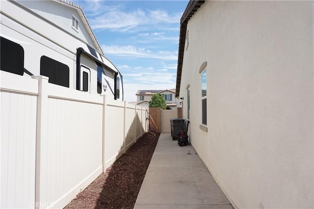 34539 Velvetleaf St, Winchester, CA 92596 - view of home's exterior featuring fence, stucco siding, and central AC unit