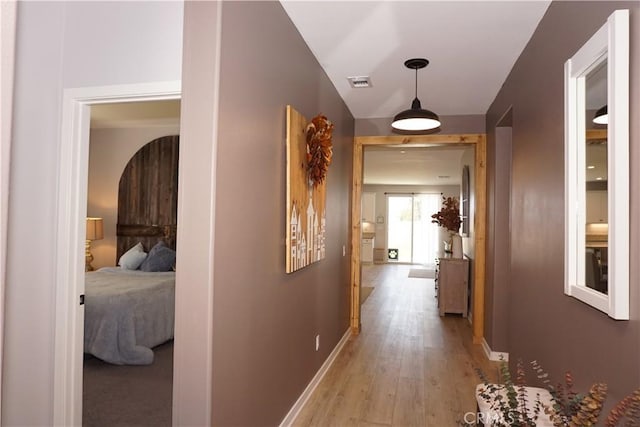 34539 Velvetleaf St, Winchester, CA 92596 - corridor with baseboards and light wood-style floors