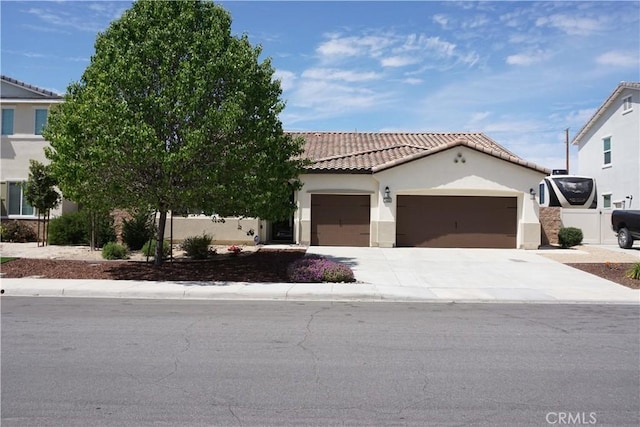 34539 Velvetleaf St, Winchester, CA 92596 - view of front of house with a garage, stucco siding, a tiled roof, and driveway