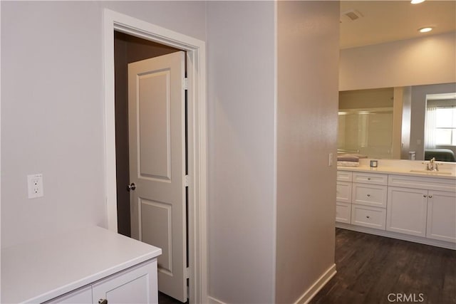 34539 Velvetleaf St, Winchester, CA 92596 - full bathroom with vanity, wood finished floors, recessed lighting, baseboards, and a shower with door